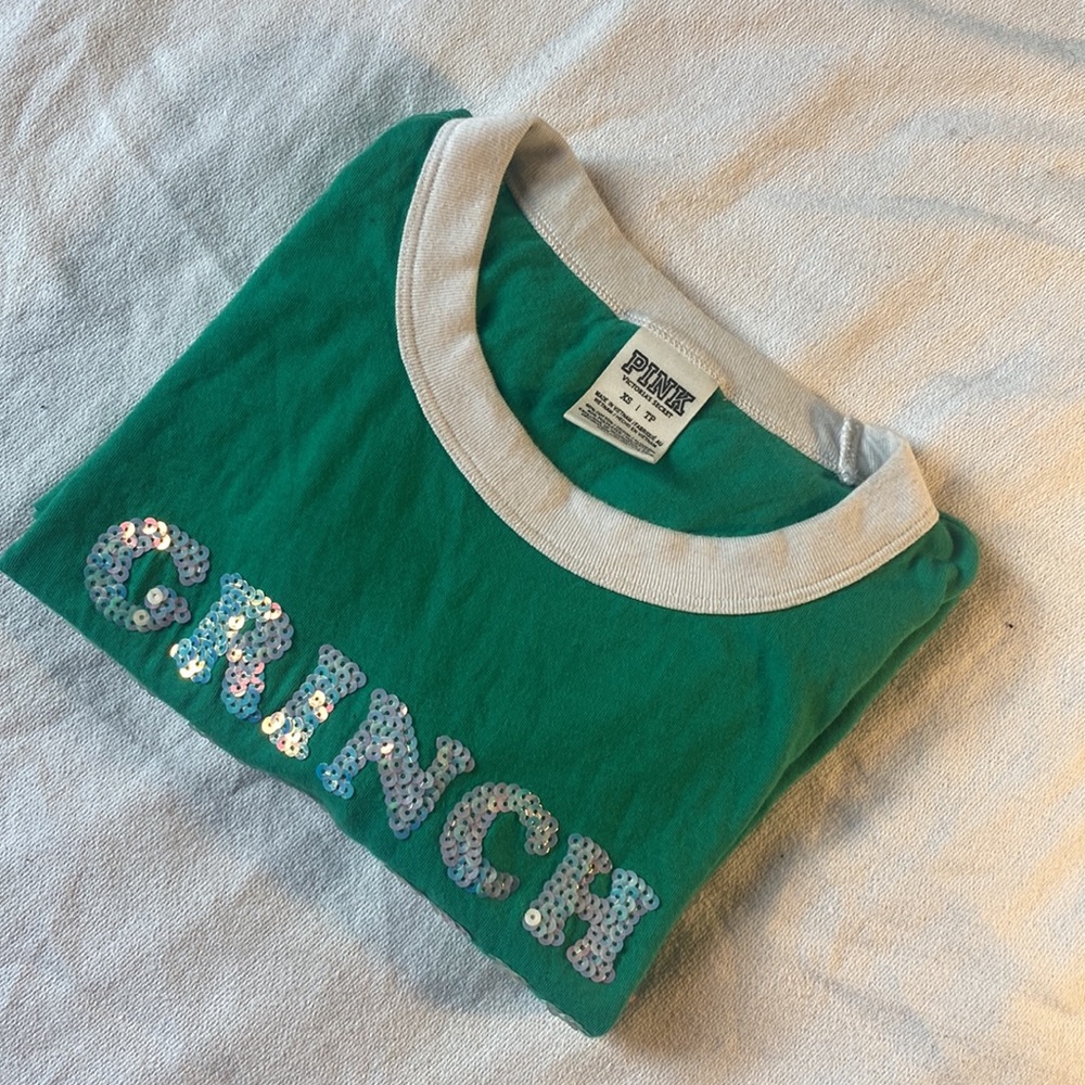 “Grinch don’t kill my vibe” T-shirt from Pink